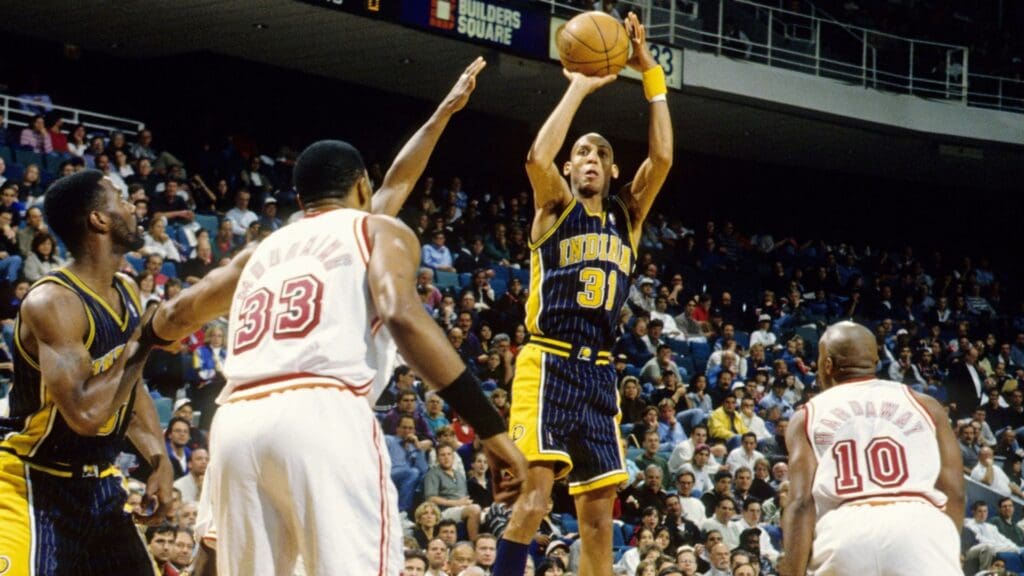 Unknown date, 1998; Miami, FL; USA; FILE PHOTO; Indiana Pacers guard Reggie Miller (31) attempts a shot against the Miami Heat at the Miami Arena.