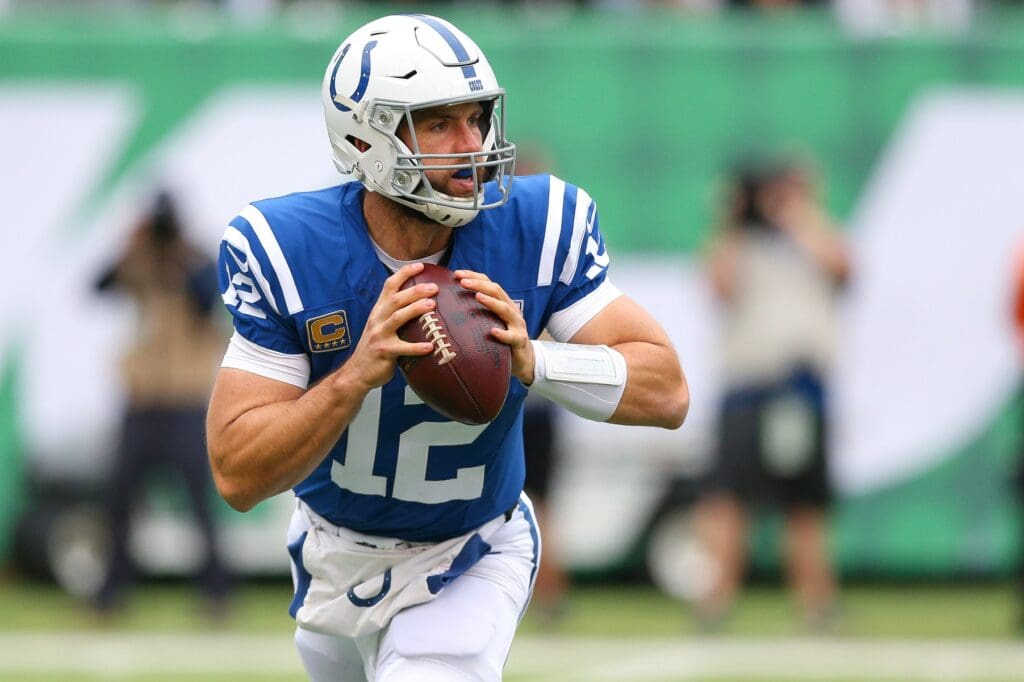 Indianapolis Colts quarterback Andrew Luck (12) drops back to pass during the first half against the New York Jets at MetLife Stadium.