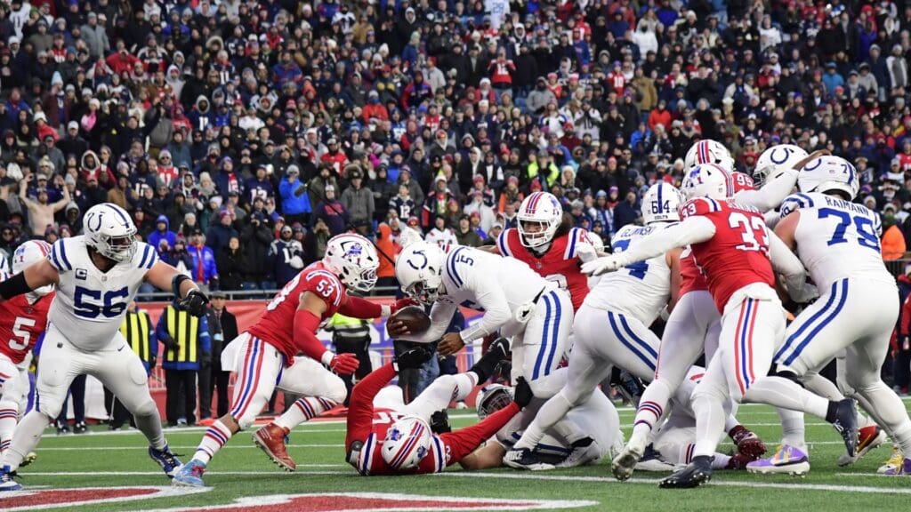 Dec 1, 2024; Foxborough, Massachusetts, USA; Indianapolis Colts quarterback Anthony Richardson (5) scores a two point conversion during the second half against the New England Patriots at Gillette Stadium