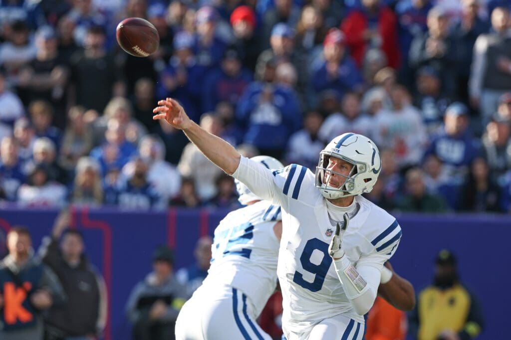 Jan 1, 2023; East Rutherford, New Jersey, USA; Indianapolis Colts quarterback Nick Foles (9) throws the ball during the first quarter against the New York Giants at MetLife Stadium.
