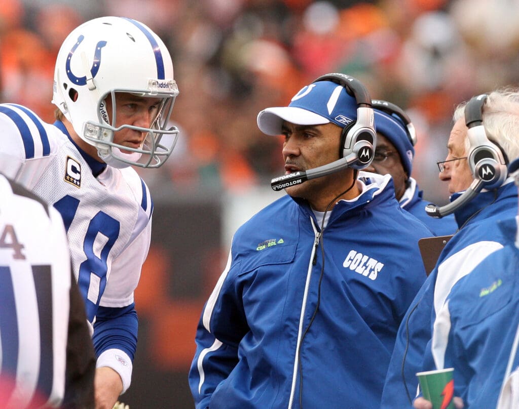 Indianapolis Colts quarterback Peyton Manning (18) on the sidelines with head coach Tony Dungy and assistant coach Tom Moore against the Cleveland Browns at Cleveland Browns Stadium. The Colts beat the Browns 10-6.