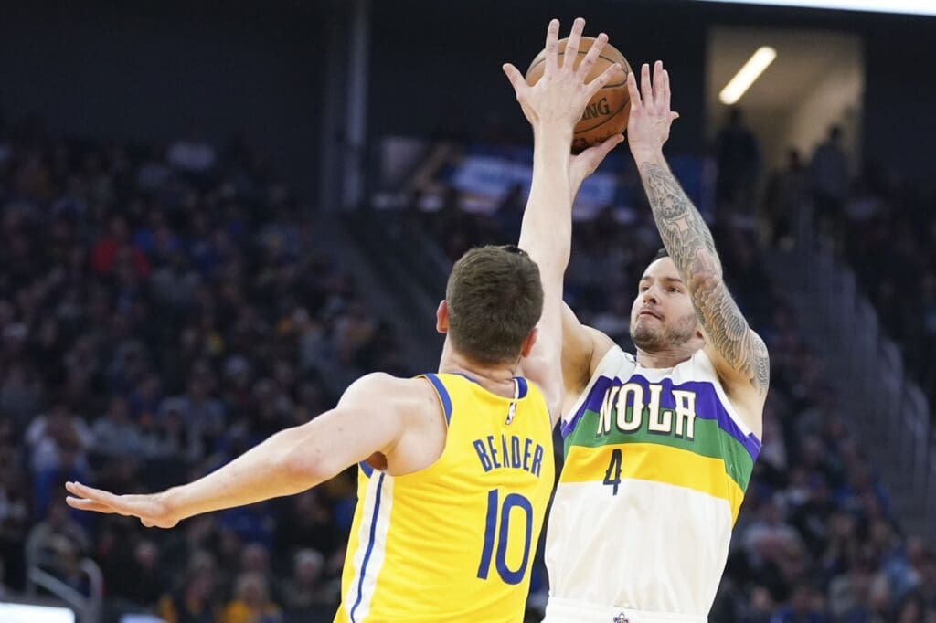 February 23, 2020; San Francisco, California, USA; New Orleans Pelicans guard JJ Redick (4) shoots the basketball against Golden State Warriors center Dragan Bender (10) during the third quarter at Chase Center.