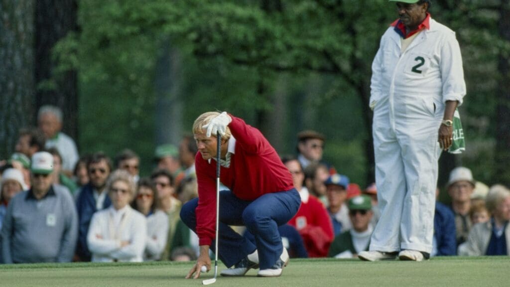 04/08/1982; Augusta, Georgia, USA; Jack Nicklaus and caddy line up putt at Augusta National Golf Course during the 1982 Masters. 