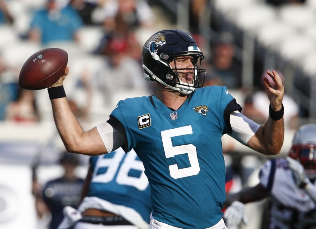 Sep 16, 2018; Jacksonville, FL, USA; Jacksonville Jaguars quarterback Blake Bortles (5) drops to throw a pass during the second half against the New England Patriots at TIAA Bank Field