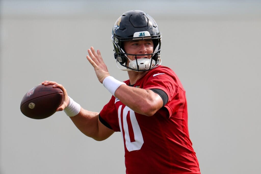 Jul 25, 2024; Jacksonville, FL, USA; Jacksonville Jaguars quarterback Mac Jones (10) participates in training camp at Miller Electric Center