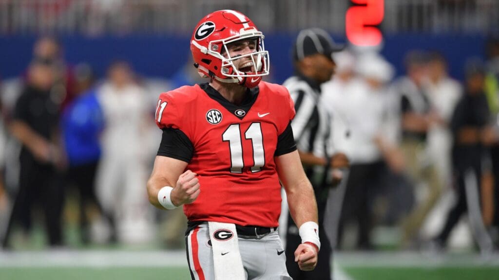 Dec 1, 2018; Atlanta, GA, USA; Georgia Bulldogs quarterback Jake Fromm (11) celebrates after a touchdown against the Alabama Crimson Tide during the second quarter in the SEC championship game at Mercedes-Benz Stadium