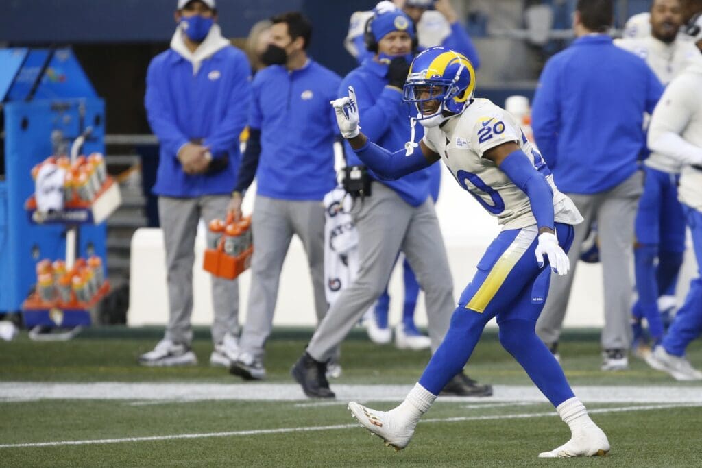 Jan 9, 2021; Seattle, Washington, USA; Los Angeles Rams cornerback Jalen Ramsey (20) reacts after blocking a pass against the Seattle Seahawks during the third quarter at Lumen Field.