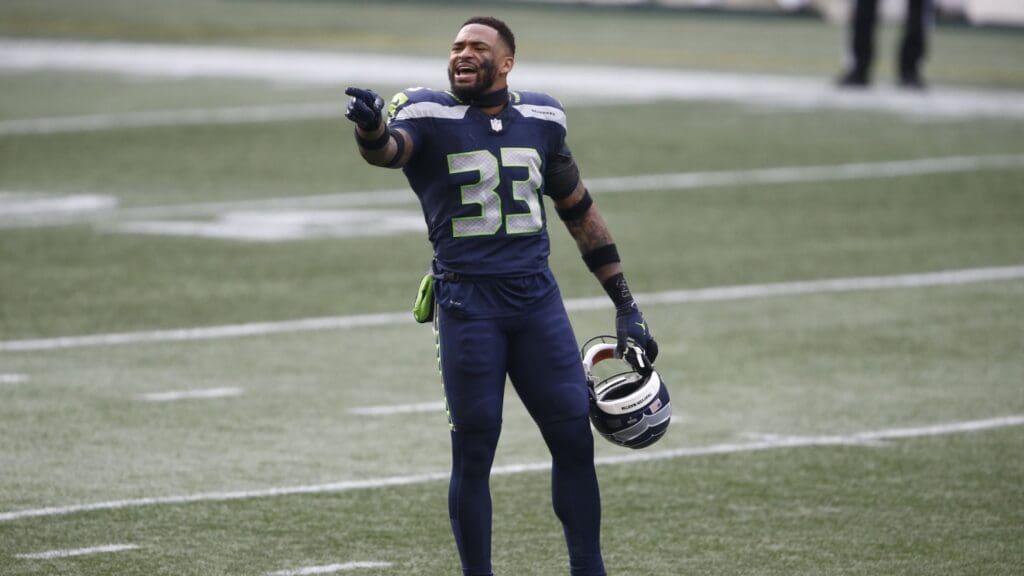 Jan 9, 2021; Seattle, Washington, USA; Seattle Seahawks safety Jamal Adams (33) yells to the sidelines during the first quarter against the Los Angeles Rams at Lumen Field.