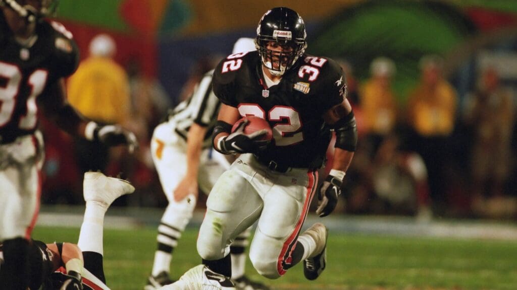 Jan 31, 1999; Miami, FL, USA; FILE PHOTO; Atlanta Falcons running back #32 Jamal Anderson in action during Super Bowl XXXIII against the Denver Broncos at Pro Player Stadium. The Broncos defeated the Falcons 34-19 earning their second consecutive Super Bowl title.