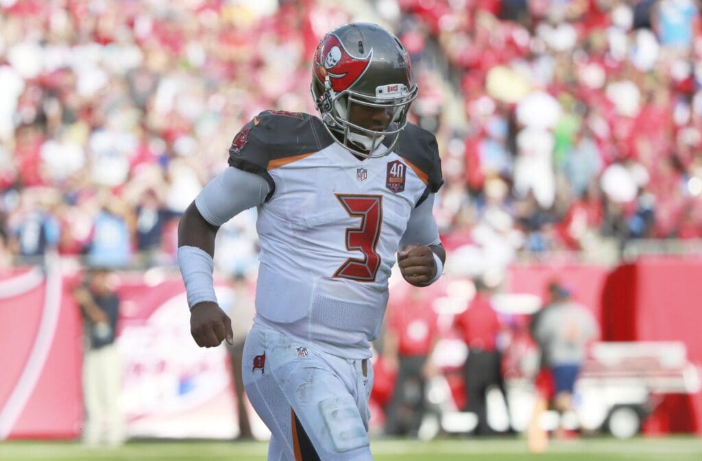 Sep 13, 2015; Tampa, FL, USA; Tampa Bay Buccaneers quarterback Jameis Winston (3) runs off the field at the end of the first half against the Tennessee Titans at Raymond James Stadium.