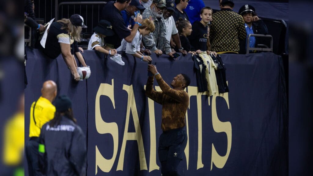 Nov 5, 2023; New Orleans, Louisiana, USA; New Orleans Saints quarterback Jameis Winston (2) signs autographss for fans during warmups before the game against the Chicago Bears at the Caesars Superdome.