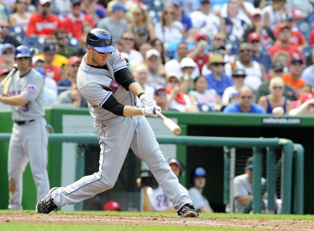 Sep 4, 2011; Washington, DC, USA; New York Mets left fielder Jason Bay (44) singles during the sixth inning against the Washington Nationals at Nationals Park.