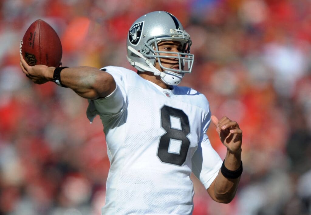 Jan 2, 2011; Kansas City, MO, USA; Oakland Raiders quarterback Jason Campbell (8) throws a pass against the Kansas City Chiefs at Arrowhead Stadium. The Raiders defeated the Chiefs 31-10.