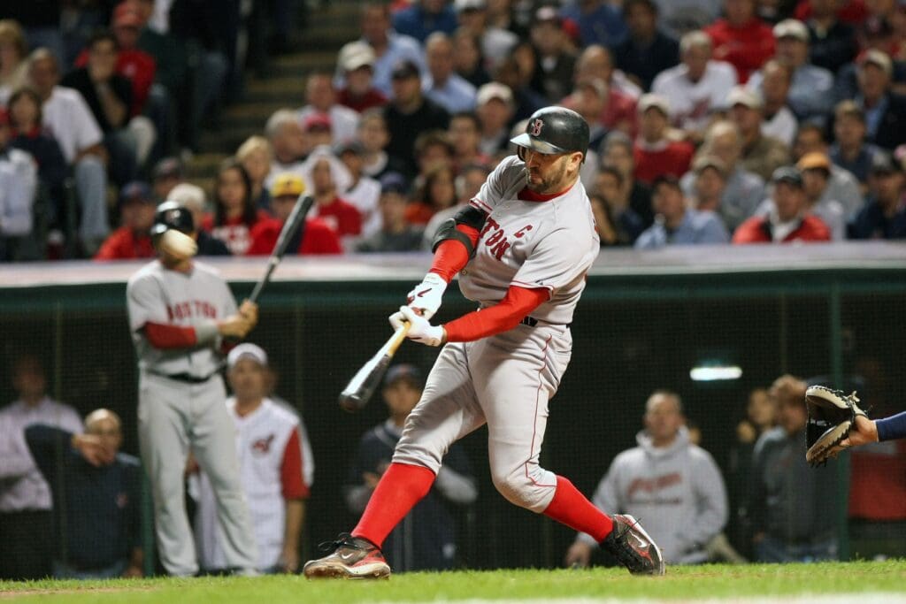 Oct 15, 2007; Cleveland, OH, USA; Boston Red Sox catcher (33) Jason Varitek hits a 2-run home run in the 7th inning against the Cleveland Indians during game 3 of the 2007 American League Championship Series at Jacobs Field.