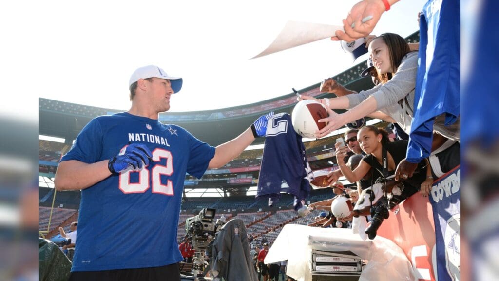January 26, 2013; Honolulu, HI, USA; NFC tight end Jason Witten of the Dallas Cowboys (82) signs autographs for fans during the NFC practice on Ohana Day at the 2013 Pro Bowl.