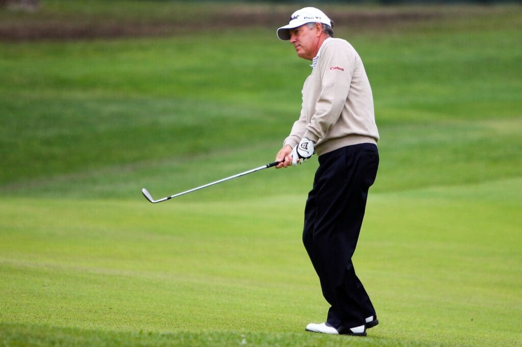 May 23, 2013; St. Louis, MO, USA; Jay Haas chips onto the 18th green during first round of the 74th Senior PGA Championship at Bellerive Country Club.