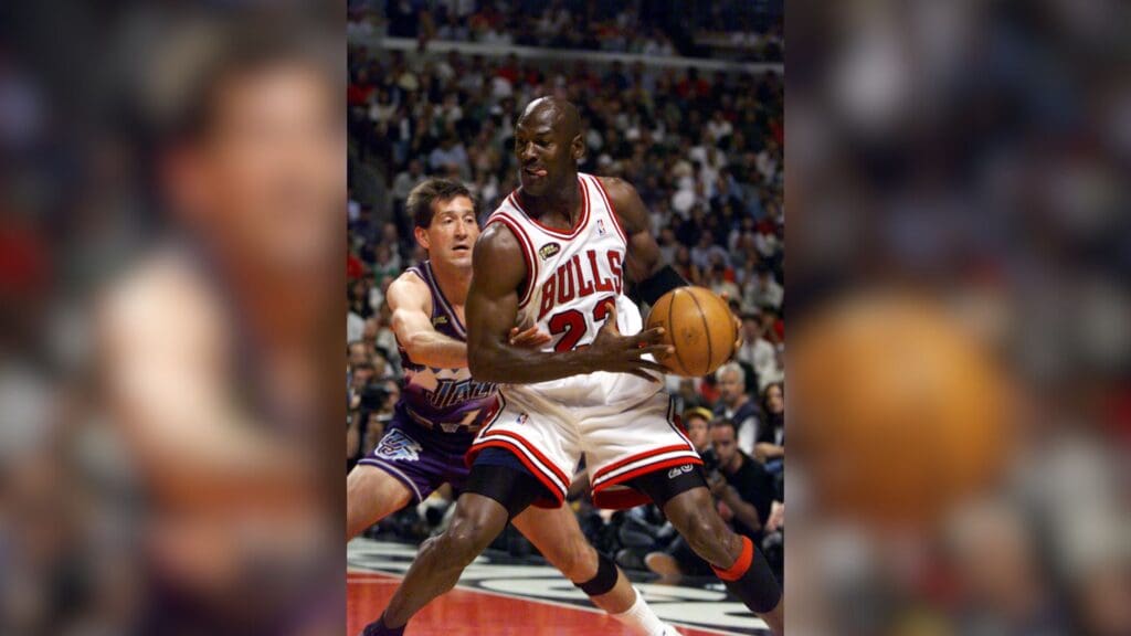 June 10, 1998; Chicago, IL, USA; Chicago Bulls guard Michael Jordan dribbles against Utah Jazz defender Jeff Hornacek in the first quarter of game four of the 2018 NBA Finals at the United Center.