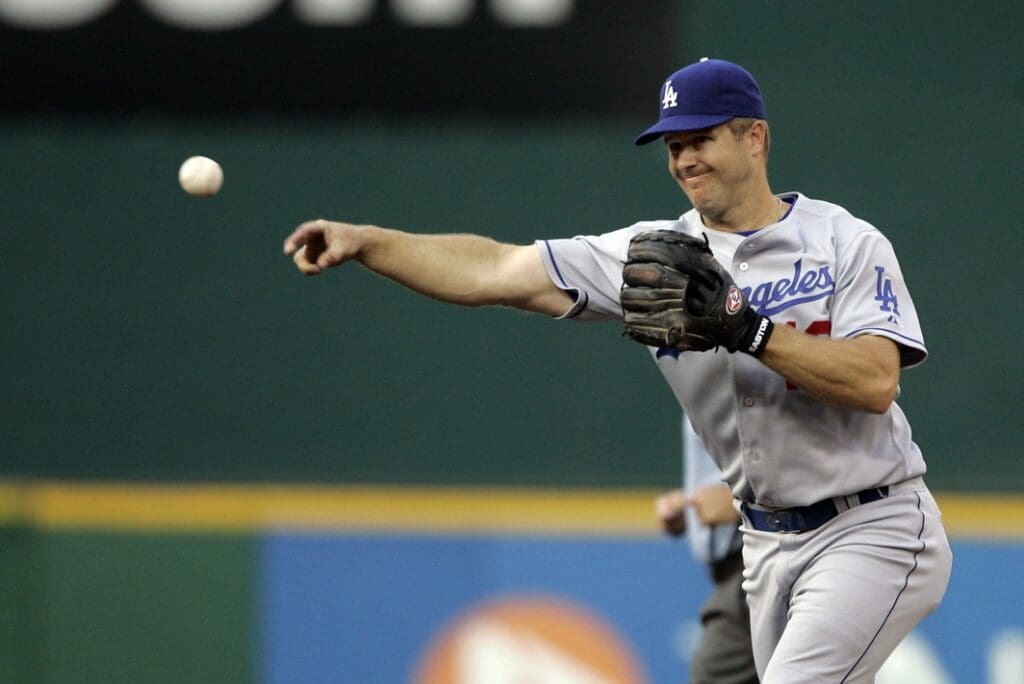 May 31, 2007; Washington, DC, USA; Los Angeles Dodgers second baseman Jeff Kent (12) throws to first base for an out against the Washington Nationals in the first inning at RFK stadium in Washington, DC. Washington defeated Los Angeles 11-4.