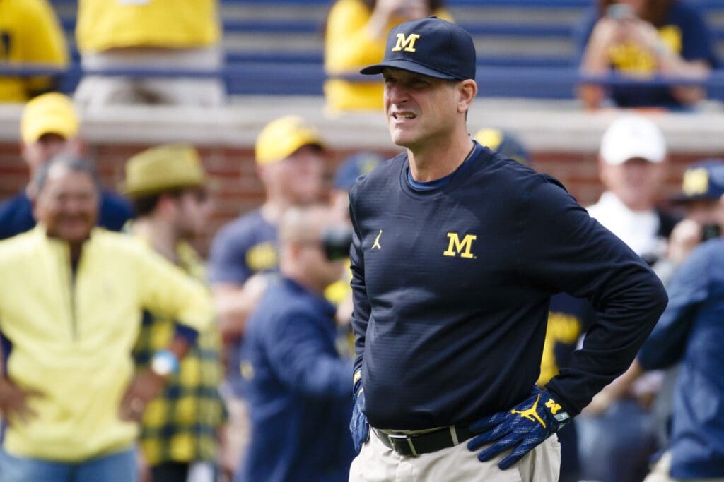 Oct 1, 2016; Ann Arbor, MI, USA; Michigan Wolverines head coach Jim Harbaugh during warm ups prior to the game against the Wisconsin Badgers at Michigan Stadium.