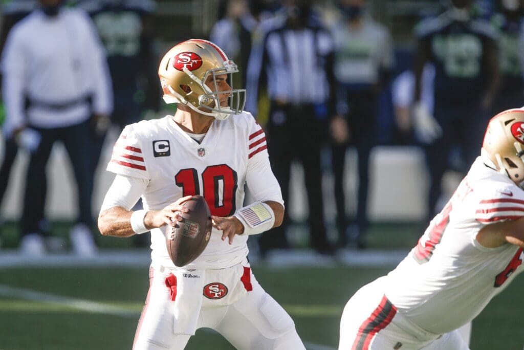 Nov 1, 2020; Seattle, Washington, USA; San Francisco 49ers quarterback Jimmy Garoppolo (10) looks to pass against the Seattle Seahawks during the first quarter at CenturyLink Field.