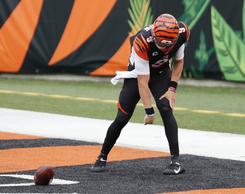 Sep 13, 2020; Cincinnati, Ohio, USA; Cincinnati Bengals quarterback Joe Burrow (9) spikes the ball after scoring a touchdown against the Los Angeles Chargers during the first half at Paul Brown Stadium.