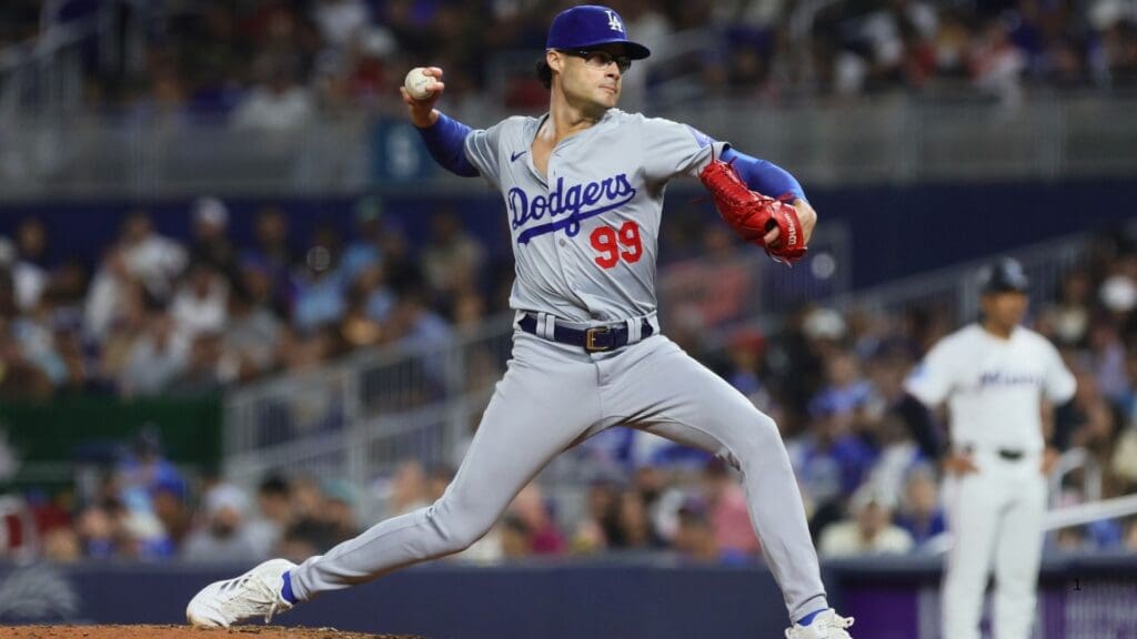 Sep 18, 2024; Miami, Florida, USA; Los Angeles Dodgers relief pitcher Joe Kelly (99) delivers a pitch against the Miami Marlins during the sixth inning at loanDepot Park.