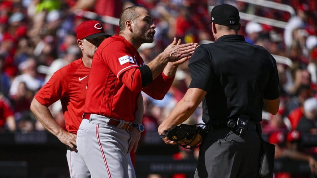Oct 1, 2023; St. Louis, Missouri, USA; Cincinnati Reds first baseman Joey Votto (19) argues with umpire Shane Livensparger (43) after he was ejected from the game after the first inning against the St. Louis Cardinals at Busch Stadium.
