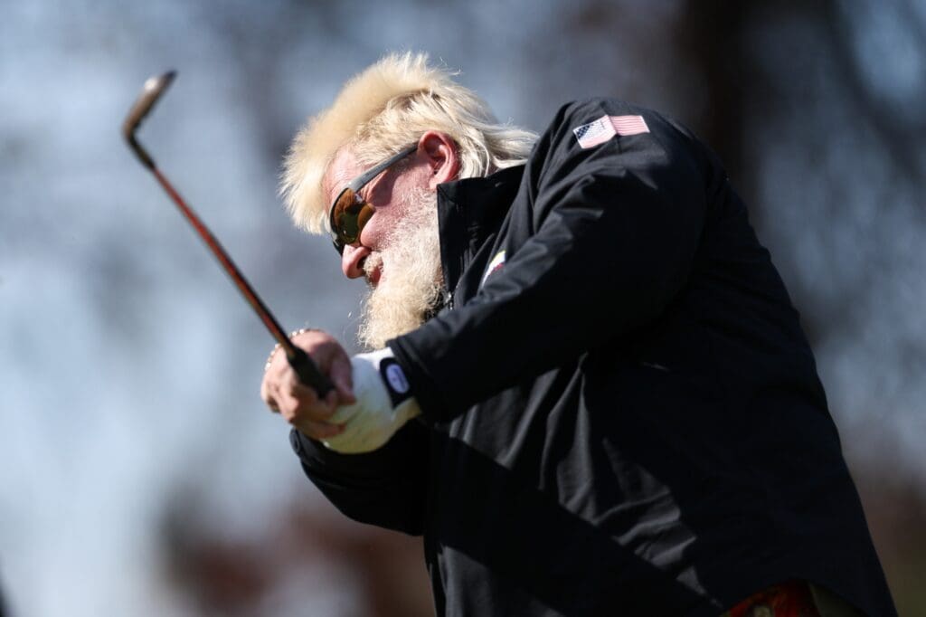 John Daly hits a tee shot from the fourth hole during the PNC Championship at The Ritz-Carlton Golf Club.