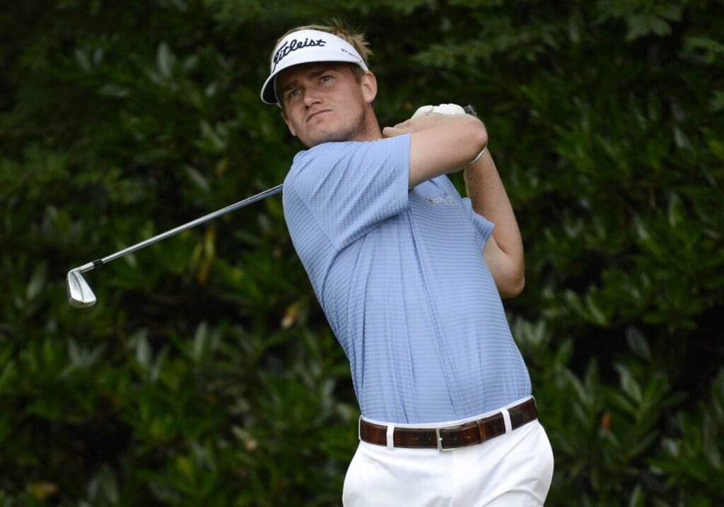 Jun 13, 2013; Ardmore, PA, USA; John Peterson tees off on the 11th hole during the first round of the 113th U.S. Open golf tournament at Merion Golf Club.
