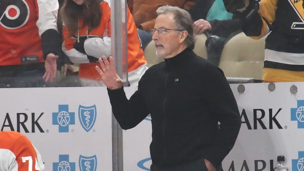 Feb 27, 2025; Pittsburgh, Pennsylvania, USA; Philadelphia Flyers head coach John Tortorella reacts on the bench against the Pittsburgh Penguins during the second period at PPG Paints Arena.