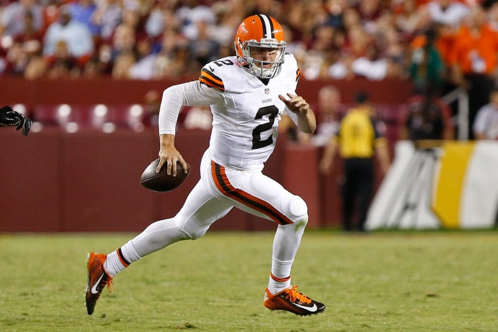Aug 18, 2014; Landover, MD, USA; Cleveland Browns quarterback Johnny Manziel (2) runs with the ball against the Washington Redskins at FedEx Field.