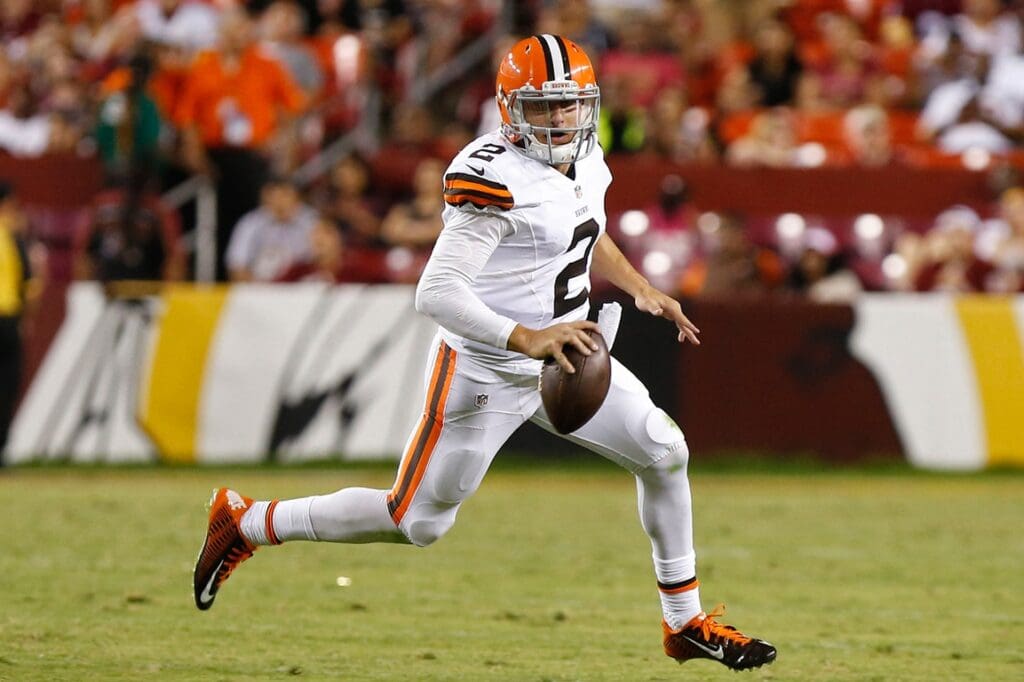 Aug 18, 2014; Landover, MD, USA; Cleveland Browns quarterback Johnny Manziel (2) runs with the ball against the Washington Redskins at FedEx Field.
