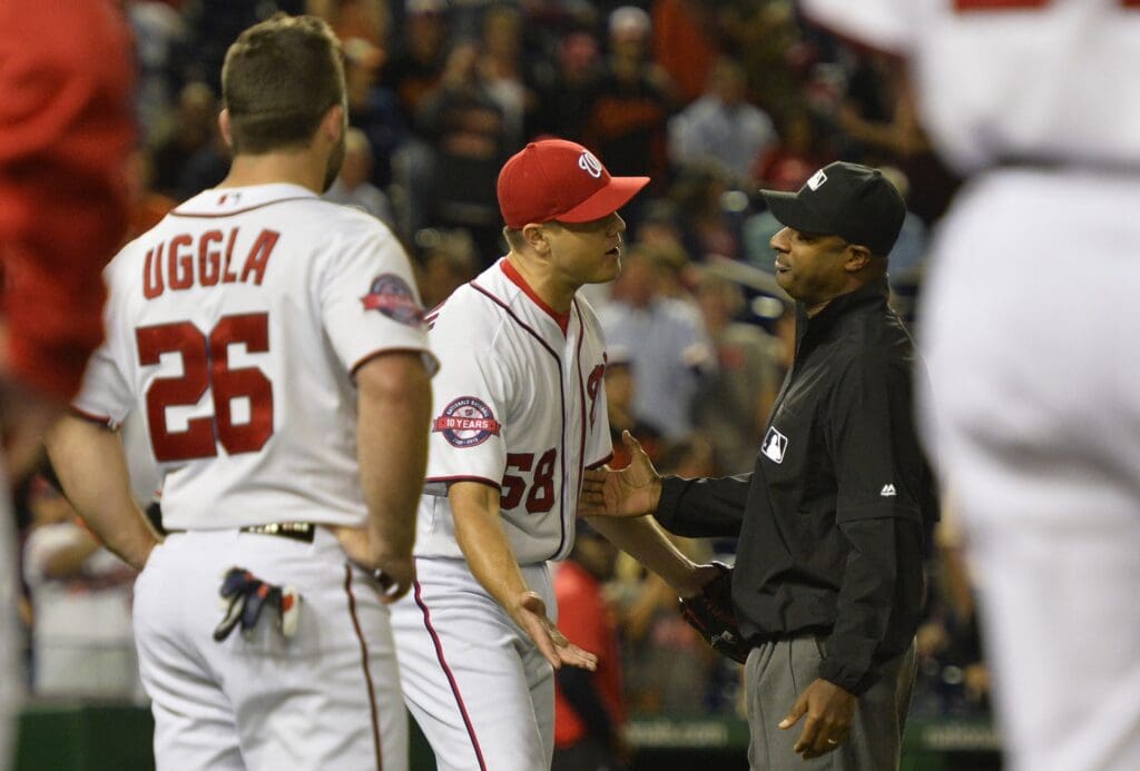 Sep 23, 2015; Washington, DC, USA; Washington Nationals relief pitcher Jonathan Papelbon (58) argues with second base umpire Alan Porter (64) after being ejected from the game during the ninth inning against the Baltimore Orioles at Nationals Park. Baltimore Orioles defeated Washington Nationals 4-3.