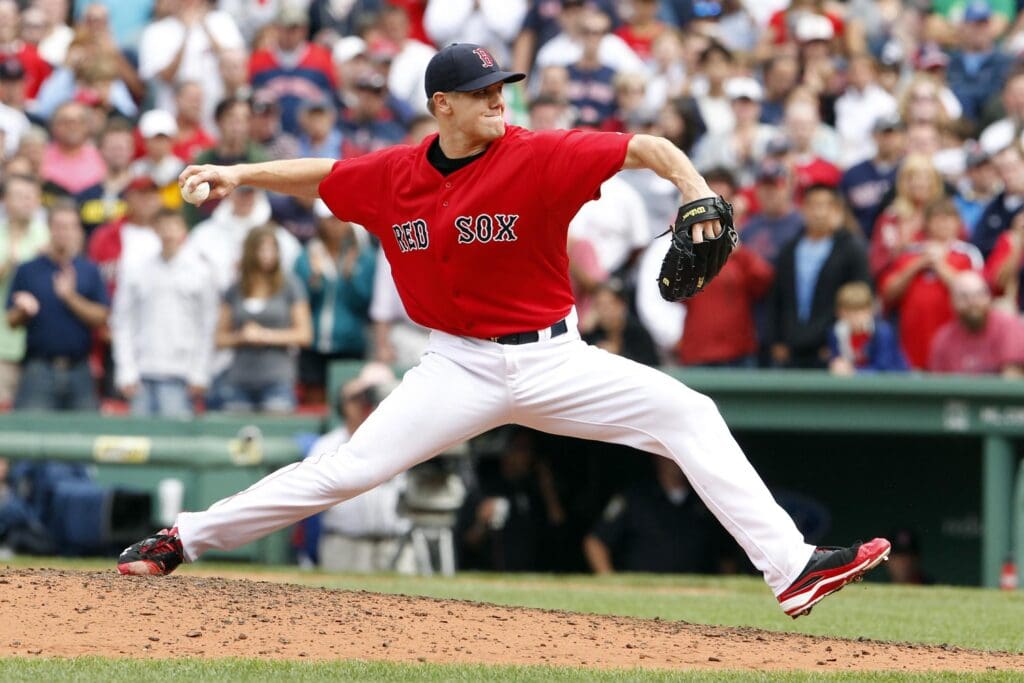 Aug 16, 2011; Boston, MA, USA; Boston Red Sox relief pitcher Jonathan Papelbon (58) throws a pitch in the ninth inning against the Tampa Bay Rays at Fenway Park. The Red Sox defeated the Rays 3-1.