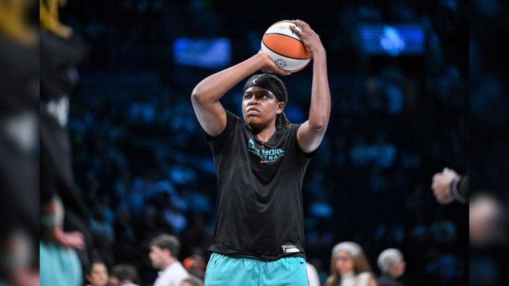 Jun 19, 2025; Brooklyn, New York, USA; New York Liberty center Jonquel Jones (35) warms up before a game against the Phoenix Mercury at Barclays Center.