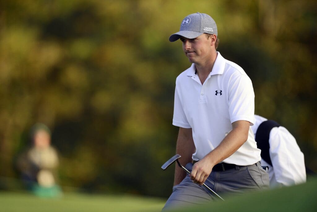 Jordan Spieth walks to the 18th green during the second round of the 2014 The Masters golf tournament at Augusta National Golf Club.