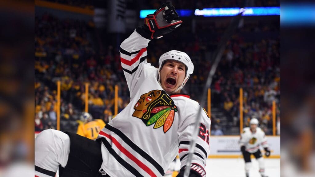 Mar 4, 2017; Nashville, TN, USA; Chicago Blackhawks right wing Jordin Tootoo (22) celebrates after scoring during the second period against the Nashville Predators at Bridgestone Arena.