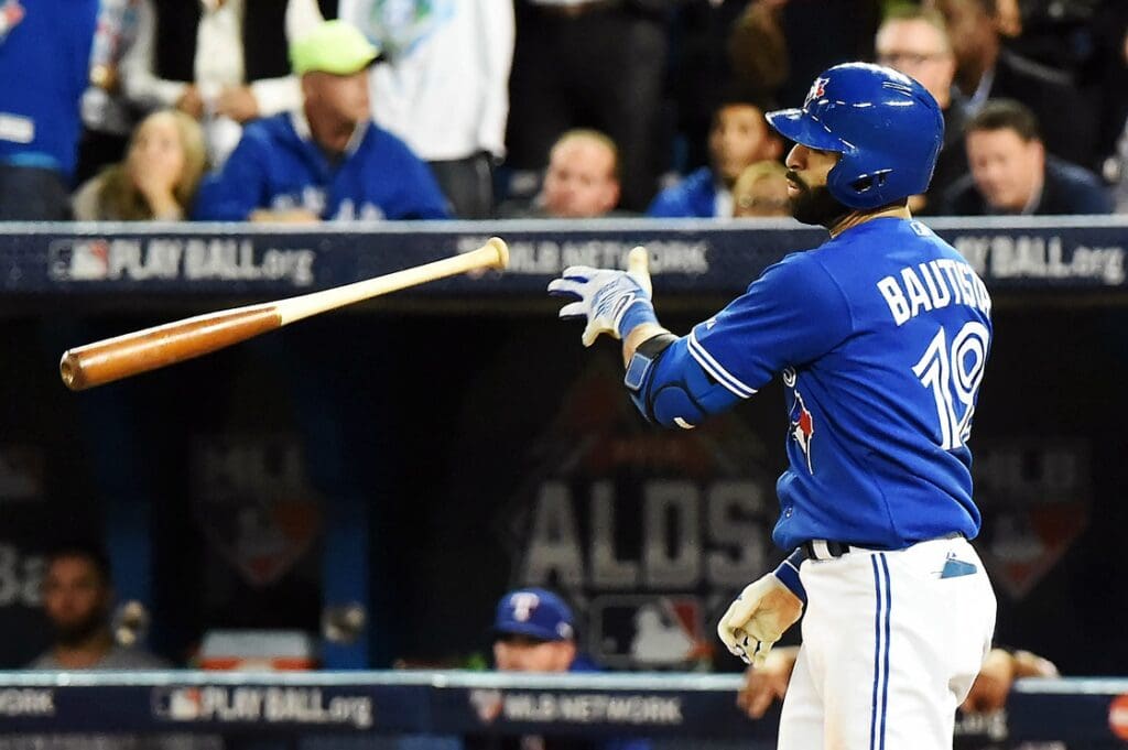 Oct 14, 2015; Toronto, Ontario, CAN; Toronto Blue Jays right fielder Jose Bautista (19) reacts after hitting a three run home run during the seventh inning against the Texas Rangers in game five of the ALDS at Rogers Centre.