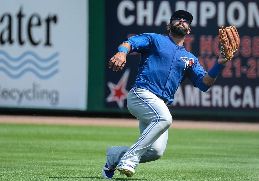 Mar 20, 2014; Clearwater, FL, USA;Toronto Blue Jays outfielder Jose Bautista (19) chases down a fly ball in the first inning of the spring training exhibition game against the Philadelphia Phillies at Bright House Field.