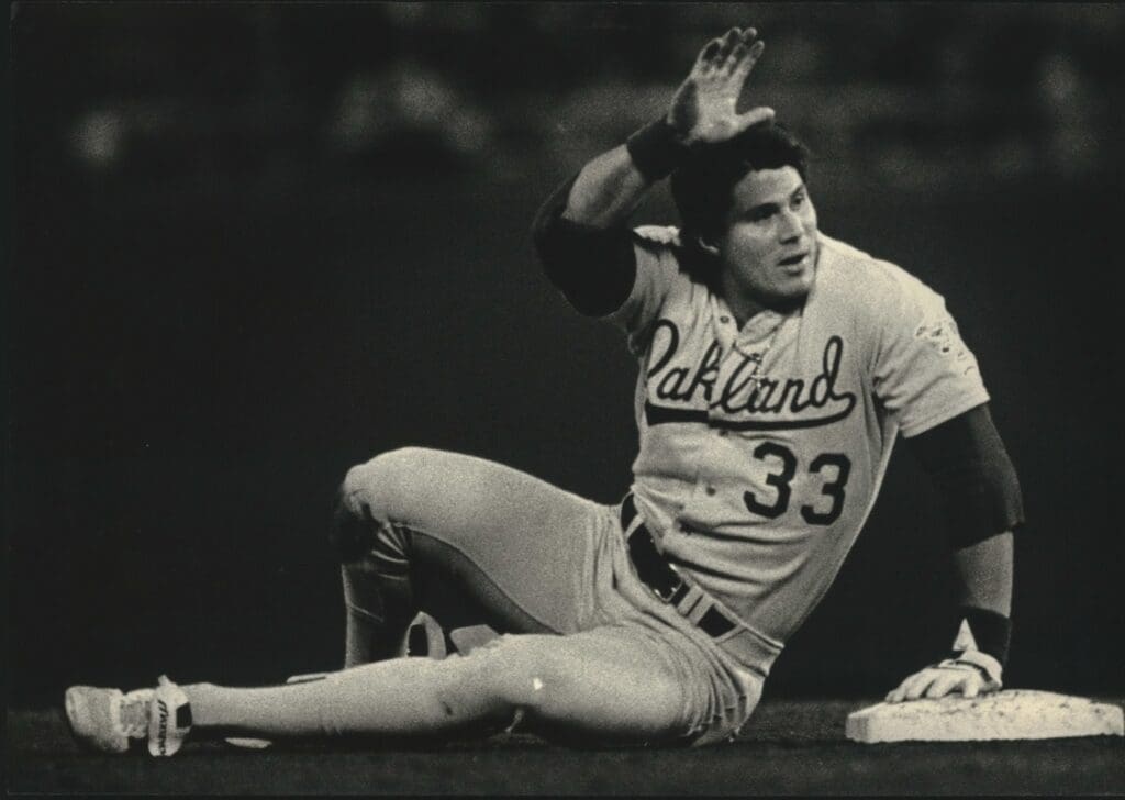 Jose Canseco asks for time after stealing his 40th base of the 1988 season, making him the first player in Major League history to hit 40 home runs and steal 40 bases in one year. 1988 Press Photo Jose Canseco Of Oakland After Stealing Base Asks For Time U S