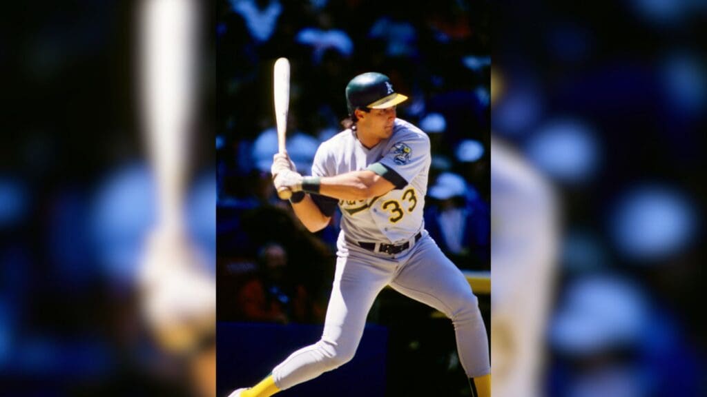 May 1991; Unknown location, USA; FILE PHOTO; Oakland Athletics outfielder Jose Canseco in action at the plate during the 1991 season.
