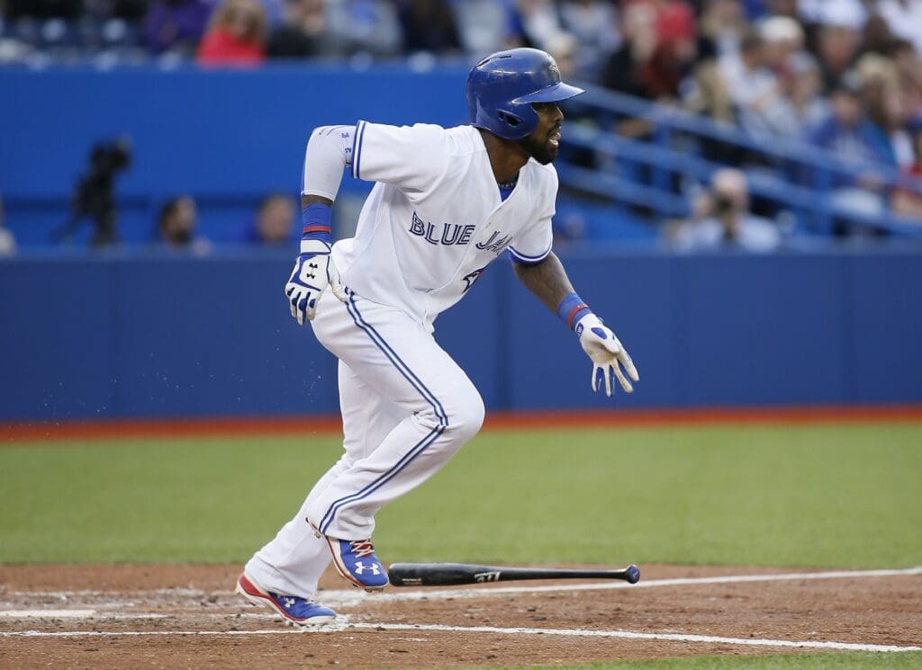 Jun 19, 2015; Toronto, Ontario, CAN; Toronto Blue Jays shortstop Jose Reyes (7) singles in the second inning against the Baltimore Orioles at Rogers Centre.