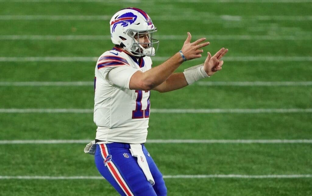 Dec 28, 2020; Foxborough, Massachusetts, USA; Buffalo Bills quarterback Josh Allen (17) reacts after his touchdown pass against the New England Patriots in the second half at Gillette Stadium.