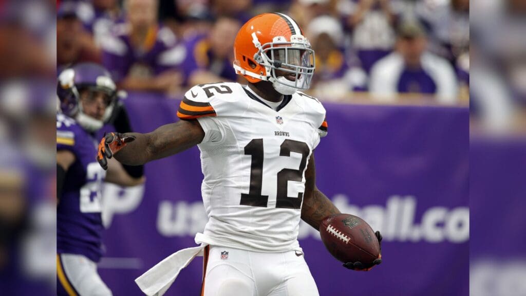 Sep 22, 2013; Minneapolis, MN, USA; Cleveland Browns wide receiver Josh Gordon (12) celebrates his 47 yard touchdown against the Minnesota Vikings at Mall of America Field at H.H.H. Metrodome. The Browns win 31-27.