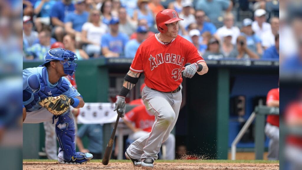 Jun 29, 2014; Kansas City, MO, USA; Los Angeles Angels left fielder JOsh Hamilton (32) hits a RBI double against the Kansas City Royals during the third inning at Kauffman Stadium.