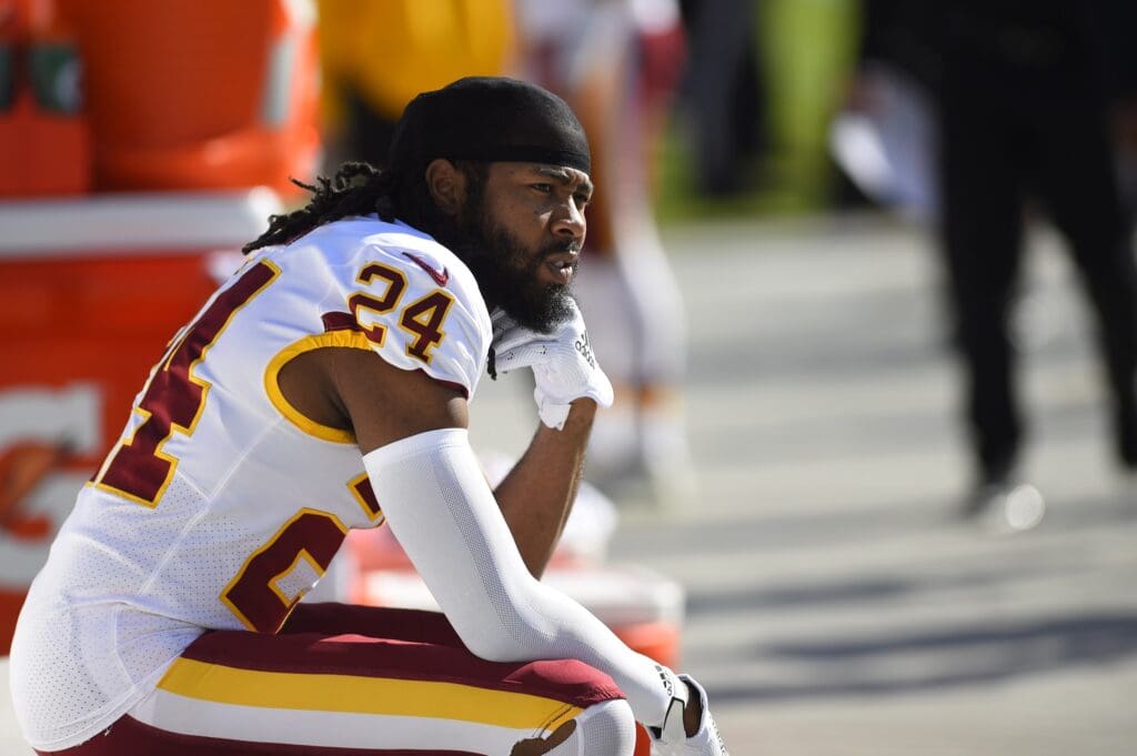 Dec 1, 2019; Charlotte, NC, USA; Washington Redskins cornerback Josh Norman (24) on the sidelines in the first quarter at Bank of America Stadium