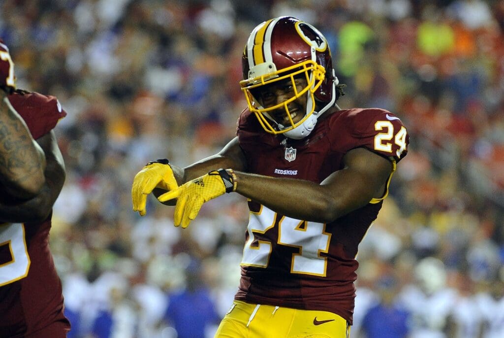 Aug 26, 2016; Landover, MD, USA; Washington Redskins defensive back Josh Norman (24) celebrates after a tackle against the Buffalo Bills during the first half at FedEx Field.