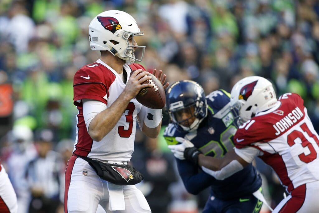Dec 30, 2018; Seattle, WA, USA; Arizona Cardinals quarterback Josh Rosen (3) looks to pass against the Seattle Seahawks during the first quarter at CenturyLink Field.