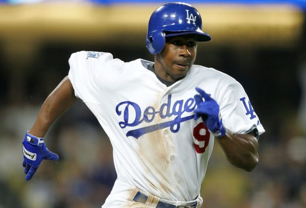 September 25, 2008: Los Angeles, CA, USA: Los Angeles Dodgers left fielder Juan Pierre (9) reaches first base on a bunt in the eighth inning against the San Diego Padres at Dodger Stadium.