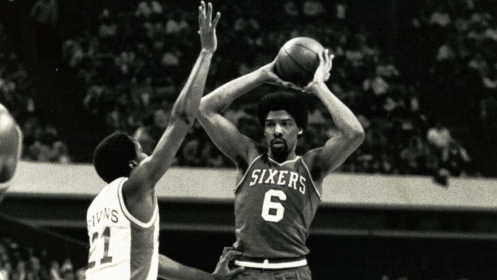 Unknown date and location; Philadelphia 76ers forward Julius Erving in action against the Atlanta Hawks. Erving was an 11-year NBA All Star, a five-time American Basketball Association all-star, was one of only three players to score more than 30,000 points and had his jersey retired by both the New Jersey Nets and the Philadelphia 76ers.